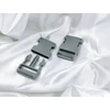 műanyag gyorscsat /30mm /kétoldalas /tuk csat /középszürke