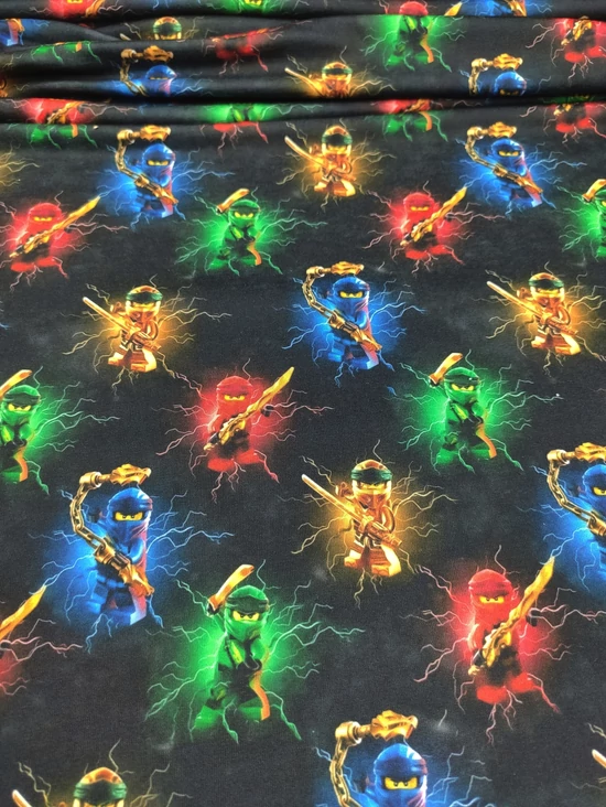 elasztikus mintás pamut jersey DIGITAL print /Ninja lego (kék figura 5.2cm×3cm) /fekete