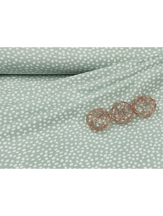 elasztikus mintás pamut jersey GOTS minősítéssel /apró fehér geomatriai alakzatok (legnagyobb minta 7mm) /menta