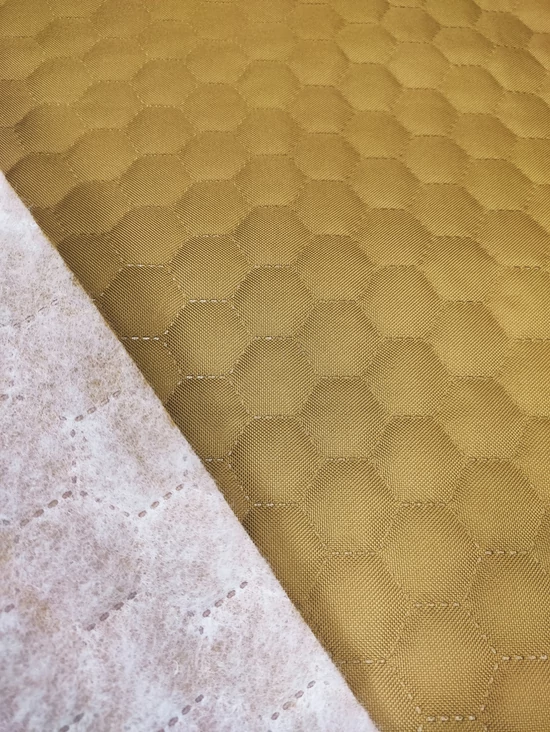 steppelt anyag /vízlepergetős /méhsejt mintás (méhsejt 3,4cm×3,4cm) /sötét arany