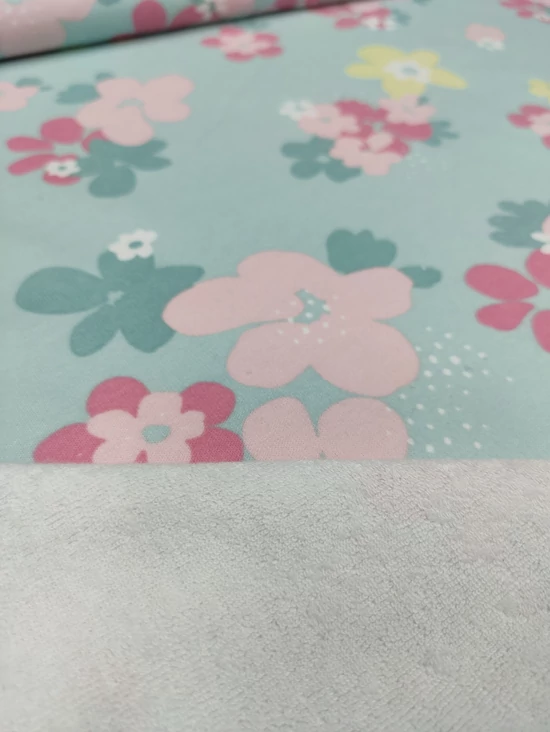 egyoldalas mintás frottír /pasztell virágok (legnagyobb sárga virág 6cm×5.7cm) /világos menta