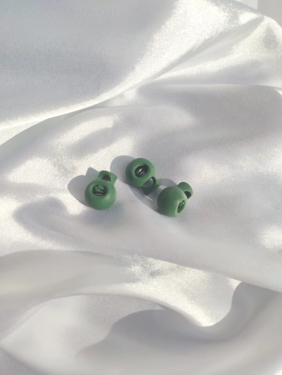 rugós zsinórvég /15mm×18mm /sötétzöld