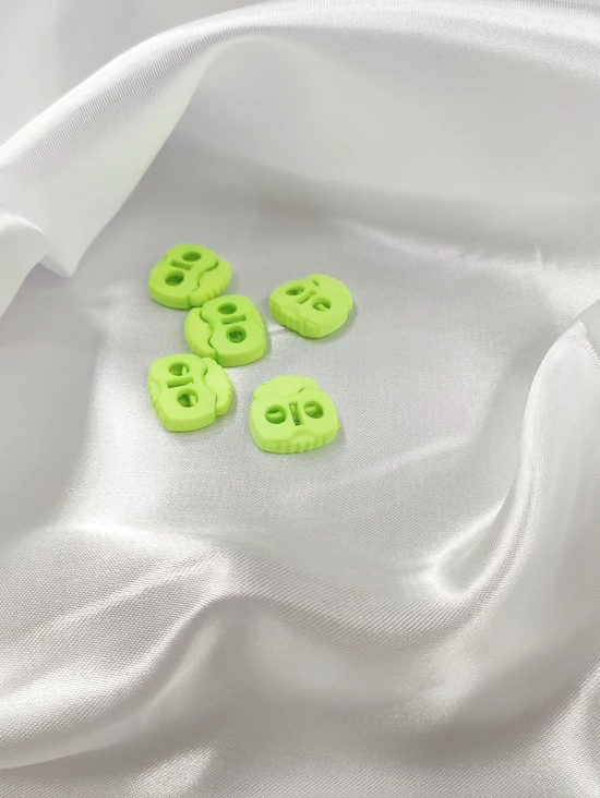 kétlyukú rugós zsinórvég /20mm×20mm /neonzöld